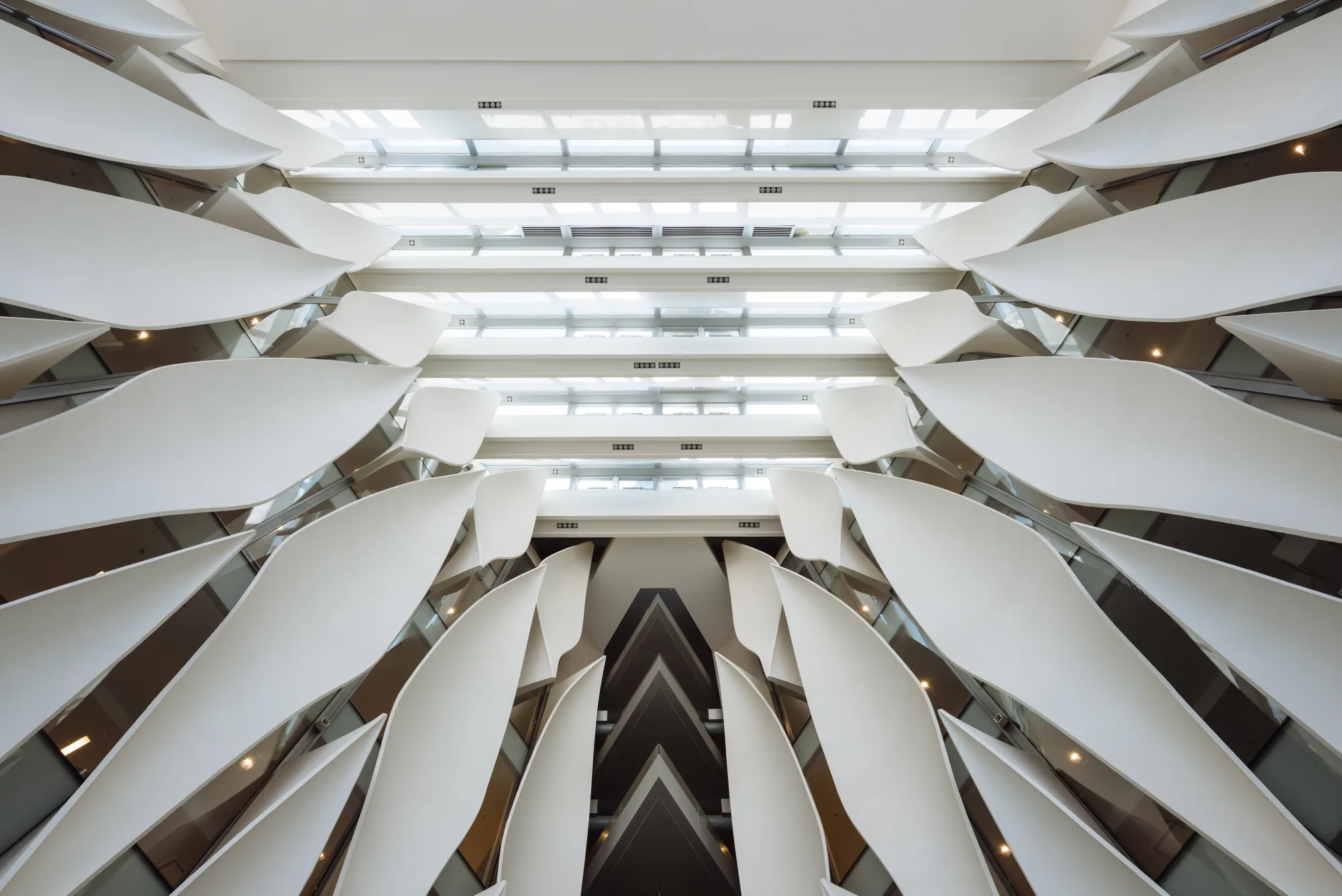 Sculptural white interior fins at Dar El-Handasah's Cairo premises