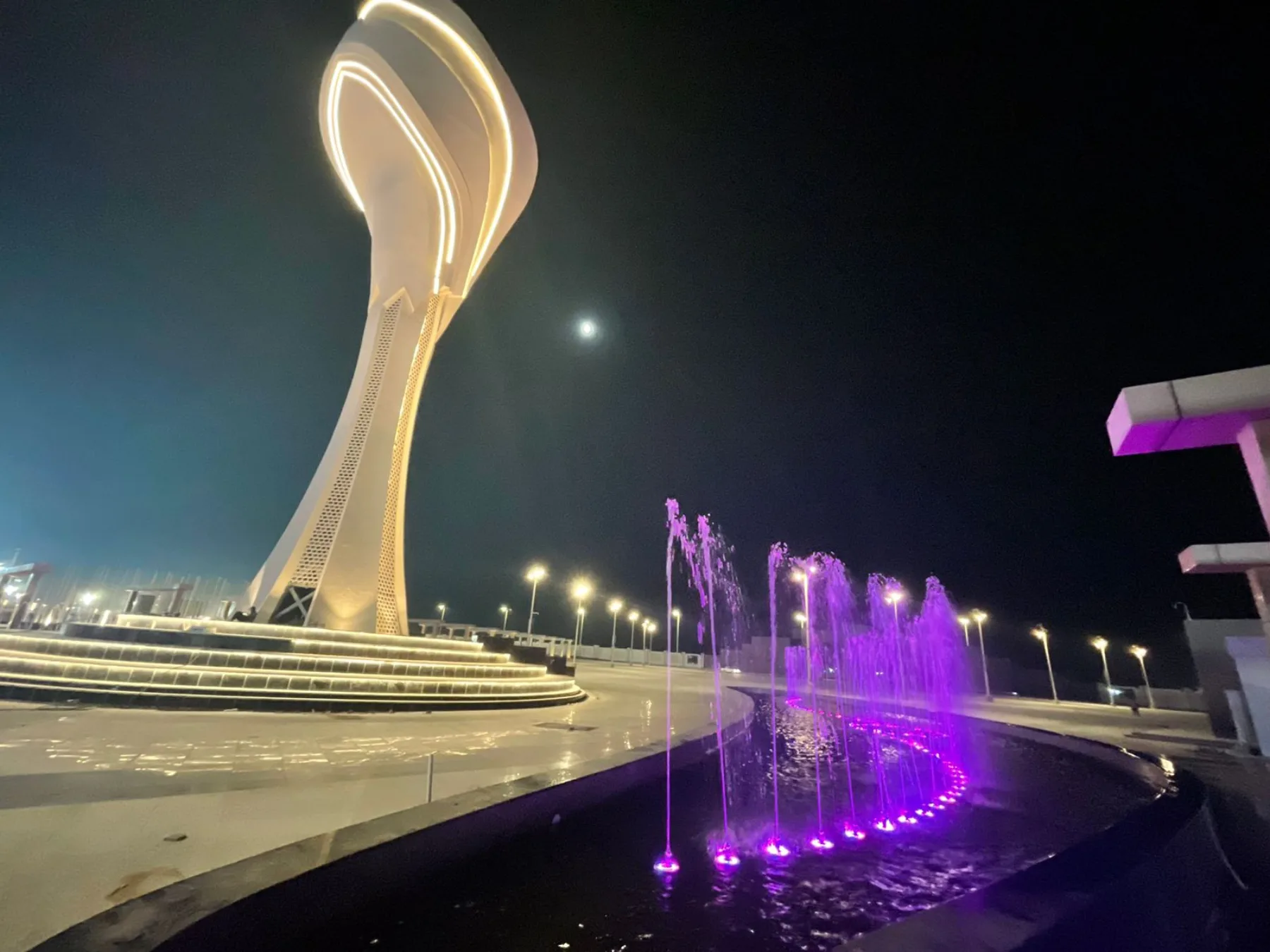 Olympic Torch landmark illuminated at night